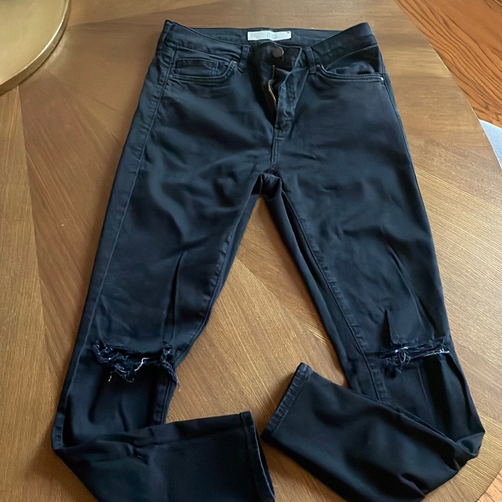 Topshop black denim with rip in knees